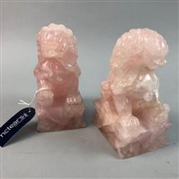 Lot 307 - A PAIR OF ROCK CRYSTAL STYLE BUDDHISTIC LIONS