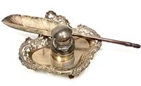 Lot 884 - AN ORNATE VICTORIAN SILVER INKWELL WITH SILVER SIMULATED FEATHER QUILL PEN