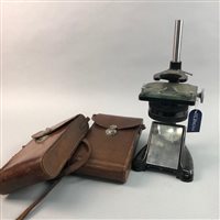 Lot 465 - A MICROSCOPE AND TWO CASED CAMERAS