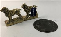Lot 480 - A PAIR OF BRASS BOOKENDS AND A PLAQUE
