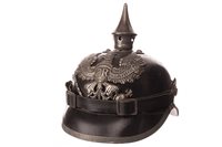 Lot 980 - A 19TH CENTURY GERMAN LEATHER SPIKED PICKLEHAUBE