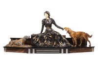 Lot 988 - AN ART DECO STYLE FIGURE GROUP OF A FEMALE AND TWO DOGS