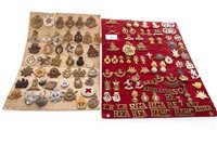 Lot 994 - A LOT OF TWO BOARDS OF CAP AND OTHER BADGES