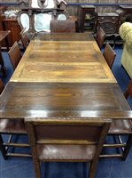 Lot 104 - AN OAK DRAW LEAF DINING TABLE WITH SIX CHAIRS