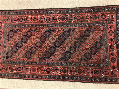 Lot 1010 - A CAUCASIAN BORDERED RUG