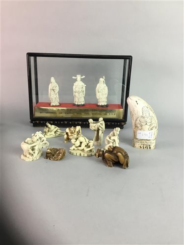 Lot 141 - A CHINESE HORN MEDAL OF A SAILING SHIP AND COMPOSITION FIGURE GROUPS