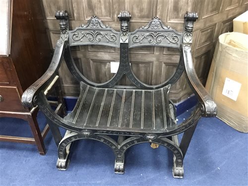 Lot 153 - A CARVED TWIN SHIELD BACKED BENCH