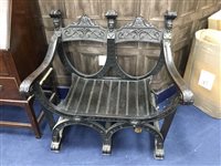 Lot 153 - A CARVED TWIN SHIELD BACKED BENCH