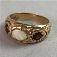 Lot 301 - AN OPAL AND GEM SET RING