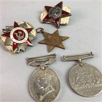 Lot 168 - A GROUP OF MEDALS AND CAP BADGES
