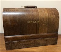 Lot 232 - A SINGER PORTABLE SEWING MACHINE