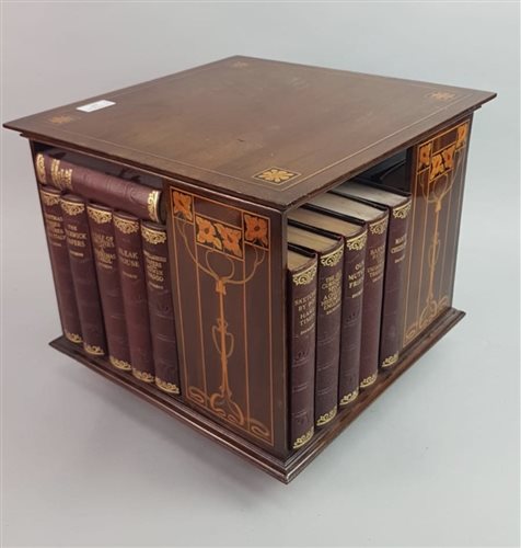 Lot 237 - A GLASGOW STYLE REVOLVING TABLE TOP BOOK SHELF