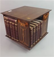 Lot 237 - A GLASGOW STYLE REVOLVING TABLE TOP BOOK SHELF
