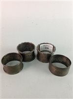 Lot 238 - A LOT OF FOUR SILVER NAPKIN RINGS