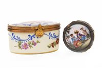 Lot 855 - A CONTINENTAL SILVER GILT AND ENAMEL PILL BOX AND A FRENCH PORCELAIN PILL BOX
