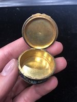 Lot 855 - A CONTINENTAL SILVER GILT AND ENAMEL PILL BOX AND A FRENCH PORCELAIN PILL BOX