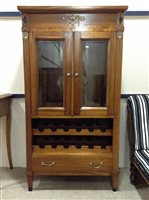 Lot 257 - A REPRODUCTION DRINKS CABINET