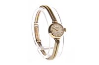 Lot 790 - A LADY'S ACCURIST GOLD WATCH