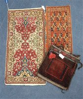 Lot 286 - A LOT OF TWO SMALL PERSIAN RUGS AND A SADDLE BAG