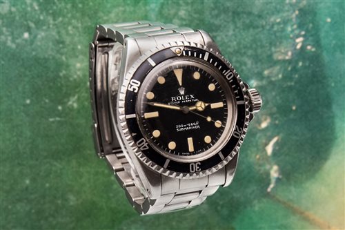 Lot 795 - A GENTLEMAN'S STAINLESS STEEL AUTOMATIC ROLEX SUBMARINER WATCH