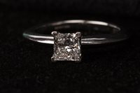 Lot 293 - A TIFFANY & CO. DIAMOND SOLITAIRE RING