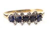 Lot 303 - A BLUE GEM AND DIAMOND RING