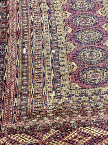 Lot 608 - BOKHARA BORDERED RUG decorated with five...