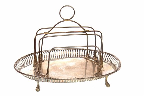 Lot 858 - A SILVER TOAST RACK