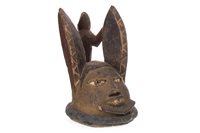 Lot 1105 - AN AFRICAN CARVED WOOD MASK