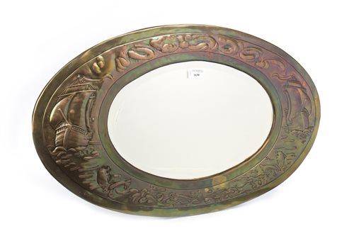 Lot 1630 - AN ARTS & CRAFTS STYLE OVAL WALL MIRROR