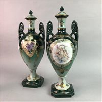 Lot 313 - A PAIR OF TWIN HANDLED LIMOGES VASES