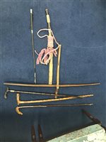 Lot 332 - A LOT OF BURMESE WEAPONS AND WALKING STICKS