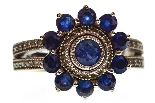 Lot 10 - A BLUE GEM AND DIAMOND CLUSTER RING