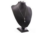 Lot 102 - A BLACK PEARL AND DIAMOND NECKLET