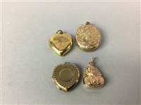 Lot 65 - A SPHINX CHARM AND THREE LOCKETS