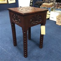 Lot 393 - A MAHOGANY CARVED SIDE TABLE
