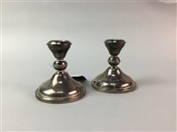 Lot 25 - A LOT OF TWO SILVER DWARF CANDLESTICKS