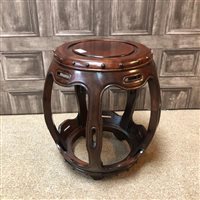 Lot 143 - A CHINESE ROSEWOOD BARREL SEAT