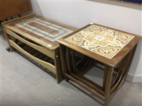 Lot 148 - A TILE TOP COFFEE TABLE AND A NEST OF TABLES