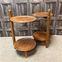 Lot 144 - A PAIR OF TWO TIER OCCASIONAL TABLES