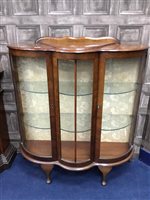 Lot 133 - A BOWFRONT DISPLAY CABINET