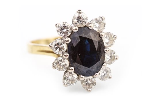 Lot 45 - A BLUE GEM AND DIAMOND RING
