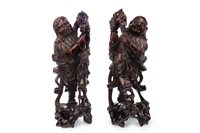 Lot 1131 - A PAIR OF CHINESE ROOTWOOD FIGURES