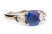 Lot 13 - A BLUE GEM AND DIAMOND RING