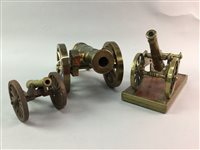 Lot 92 - A LOT OF THREE BRASS TABLE TOP CANNONS