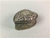 Lot 95 - A SILVER EMBOSSED HEART SHAPED TRINKET BOX