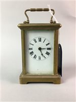 Lot 104 - A SMALL CARRIAGE CLOCK