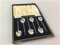 Lot 180 - A SET OF SIX SILVER ENAMELLED COFFEE BEAN TERMINAL SPOONS