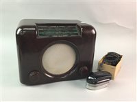 Lot 57 - A VINTAGE BUSH BAKELITE RADIO AND A SMOOTHIE PORTABLE IRON