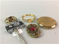 Lot 115 - A KKW CAMERA LIGHTER, BEADS, COSTUME JEWELLERY AND A COMPACT